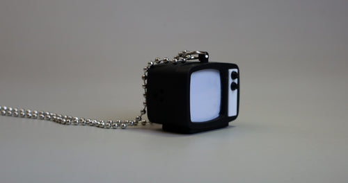 Vintage TV necklace with light and sound